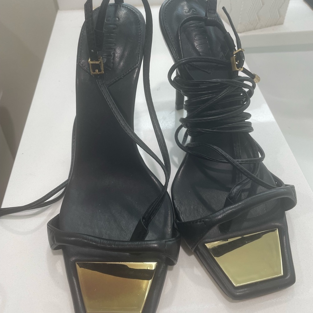 SCHUTZ Black and Gold Strappy Heels